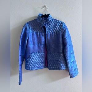 Metallic holographic blue/purple jacket.